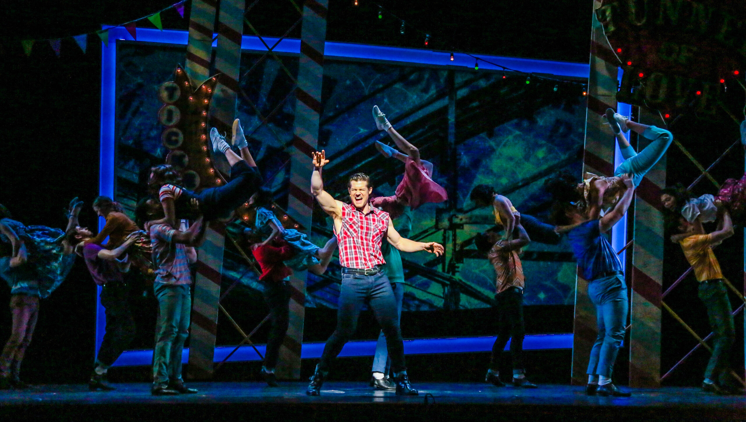 Tim Rogan as Chad in the TUTS 2018 production of All Shook Up at Miller Outdoor Theatre. Photo by Melissa Taylor.